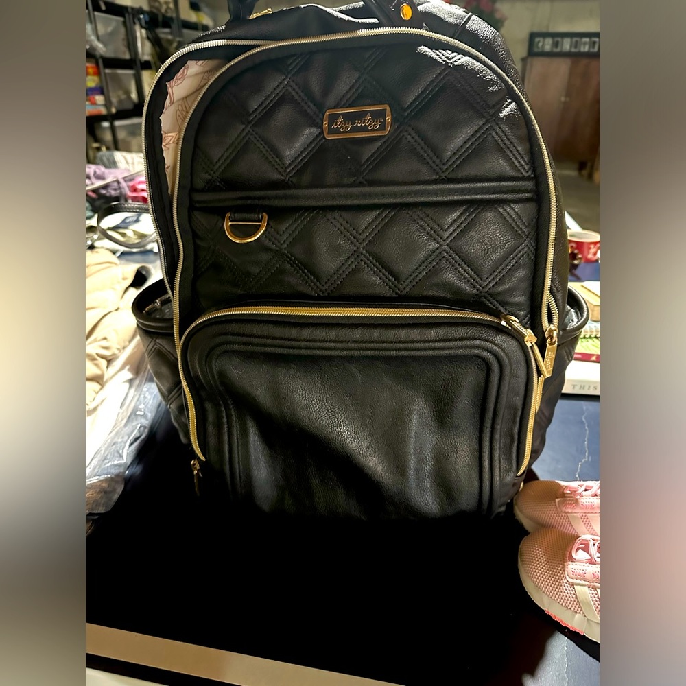 Itzy ritzy black back pack